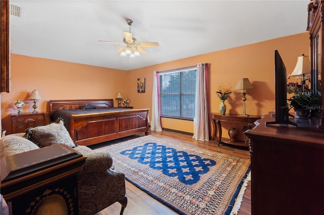 114 Shaddock Dr, Auburndale, FL 33823 - bedroom featuring ceiling fan and wood finished floors