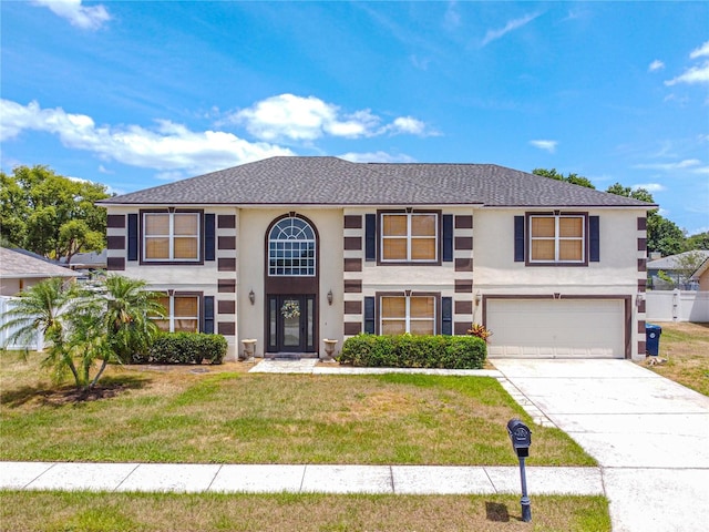 114 Shaddock Dr, Auburndale, FL 33823 - view of front of home featuring fence, a garage, stucco siding, a front yard, and concrete driveway
