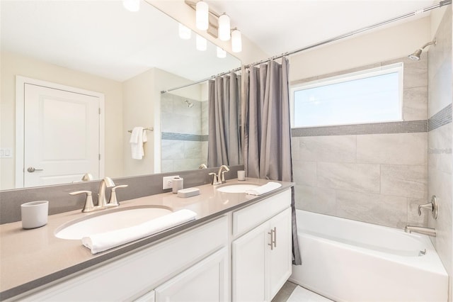 bathroom with double vanity, a sink, and shower / bathtub combination with curtain