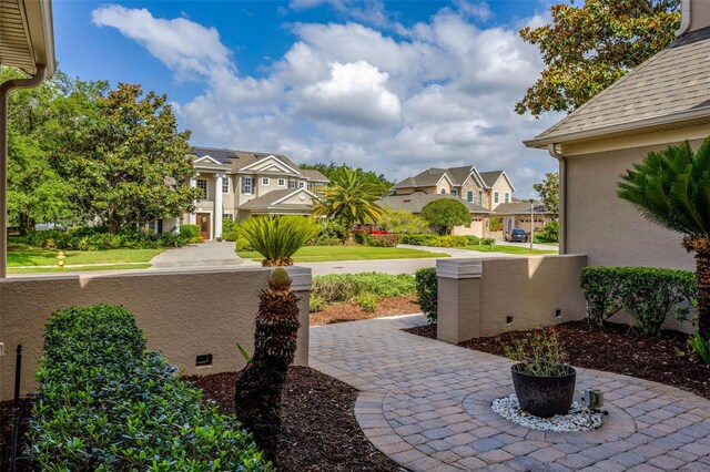 14003 Hampshire Bay Cir, Winter Garden, FL 34787 - view of patio / terrace featuring a residential view