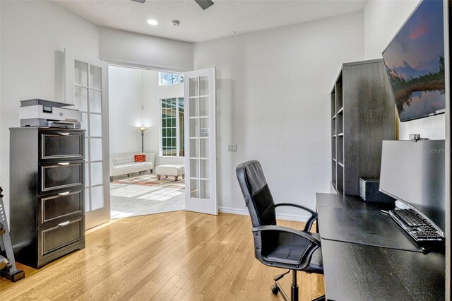 14003 Hampshire Bay Cir, Winter Garden, FL 34787 - office space featuring baseboards, recessed lighting, french doors, a ceiling fan, and light wood-style flooring
