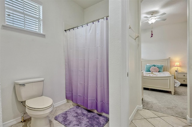 14003 Hampshire Bay Cir, Winter Garden, FL 34787 - full bathroom with tile patterned floors, a ceiling fan, toilet, and connected bathroom