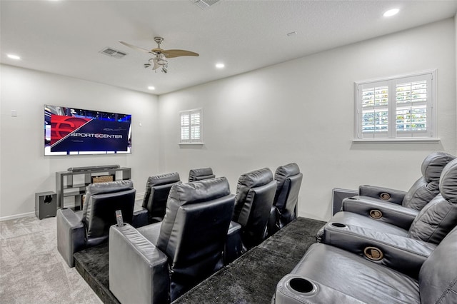 14003 Hampshire Bay Cir, Winter Garden, FL 34787 - carpeted home theater featuring a ceiling fan, visible vents, plenty of natural light, and recessed lighting