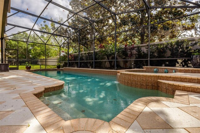 14003 Hampshire Bay Cir, Winter Garden, FL 34787 - view of swimming pool featuring a fenced in pool, a lanai, a fenced backyard, and a patio area