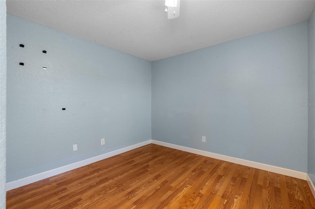 7449 Sugar Bend Dr Unit 7449, Orlando, FL 32819 - spare room with light wood finished floors and baseboards