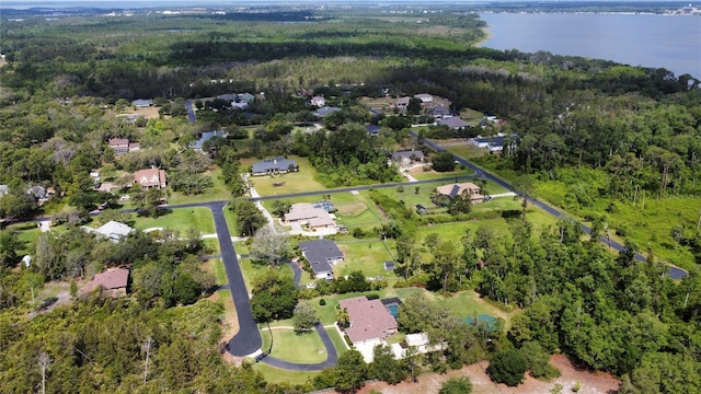 aerial view with a view of trees and a water view