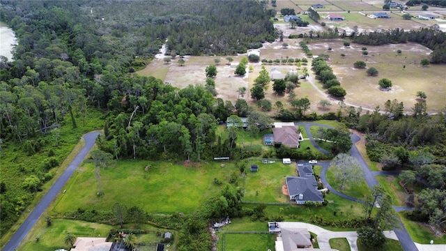 bird's eye view featuring a forest view