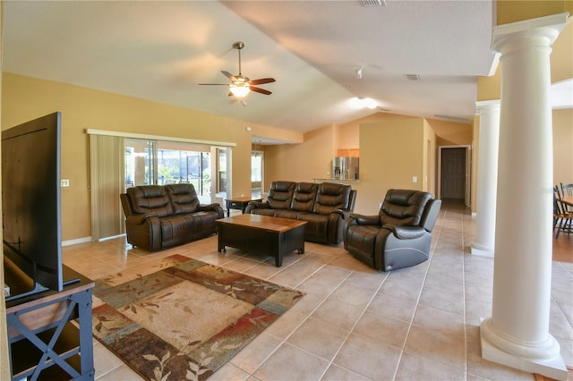 living room featuring visible vents, ornate columns, a ceiling fan, light tile patterned floors, and vaulted ceiling