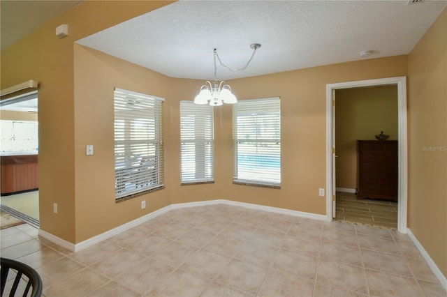 unfurnished dining area with light tile patterned floors, baseboards, and a notable chandelier
