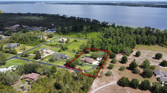 aerial view featuring a water view and a residential view