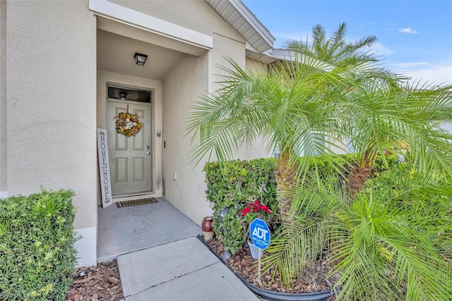 822 Sheen Cir, Haines City, FL 33844 - property entrance featuring stucco siding