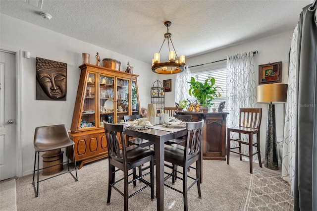 822 Sheen Cir, Haines City, FL 33844 - dining area featuring a textured ceiling, a notable chandelier, and light carpet