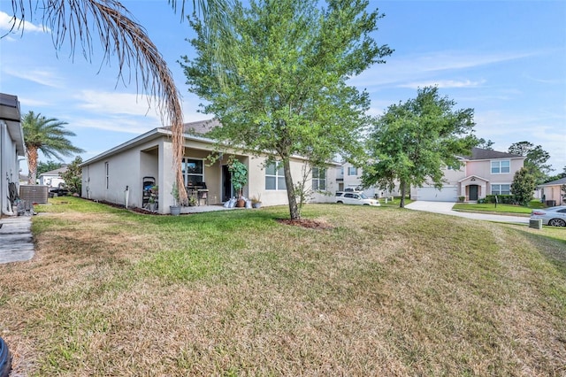 822 Sheen Cir, Haines City, FL 33844 - view of front of house featuring a front yard and stucco siding