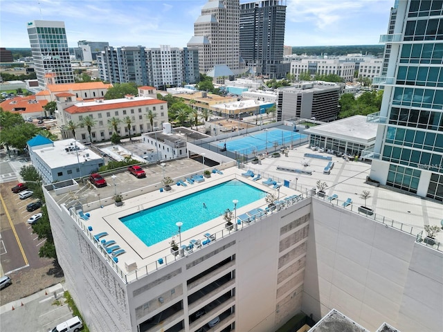 birds eye view of property with a view of city