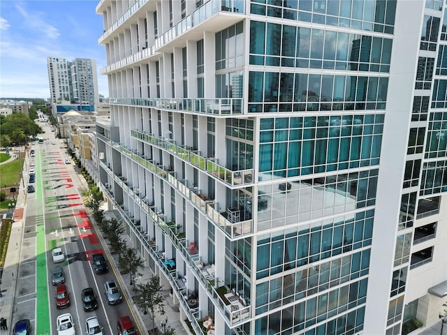 view of building exterior featuring a view of city