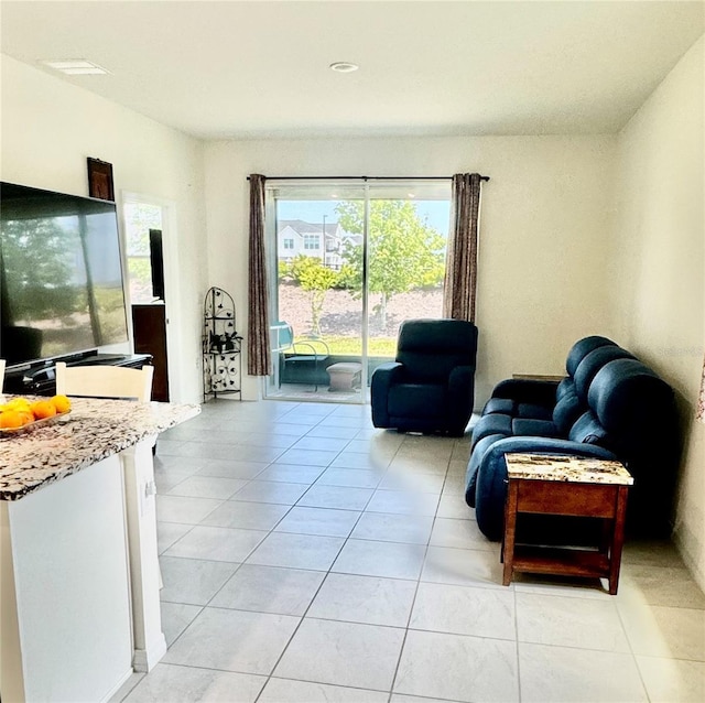 7871 Penrose Pl, Wildwood, FL 34785 - living room with light tile patterned floors