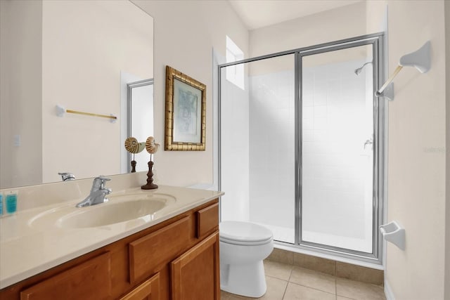 1031 Marcello Blvd, Kissimmee, FL 34746 - full bathroom featuring vanity, toilet, tile patterned flooring, and a stall shower