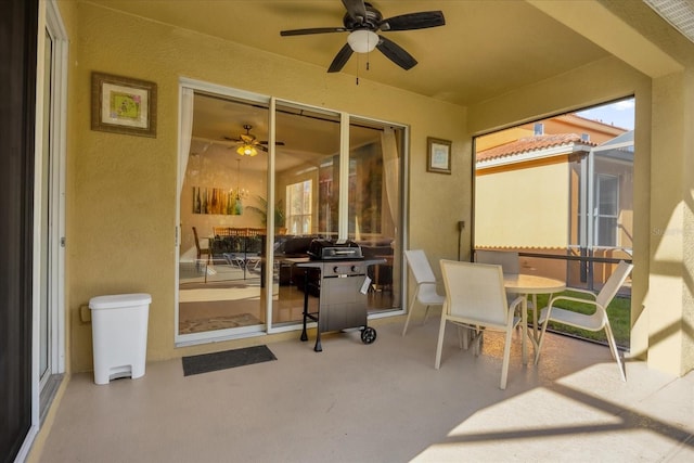 1031 Marcello Blvd, Kissimmee, FL 34746 - sunroom / solarium with a ceiling fan and outdoor dining space
