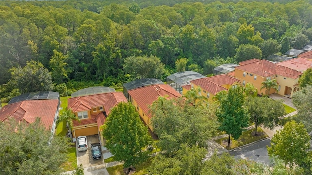 1031 Marcello Blvd, Kissimmee, FL 34746 - drone / aerial view featuring a view of trees and a residential view