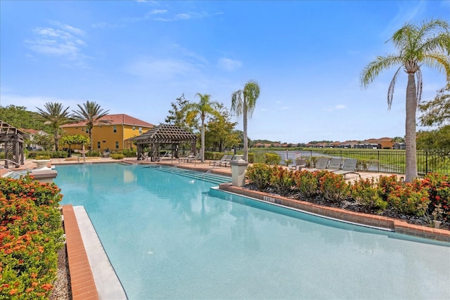 1031 Marcello Blvd, Kissimmee, FL 34746 - community pool featuring fence and a gazebo