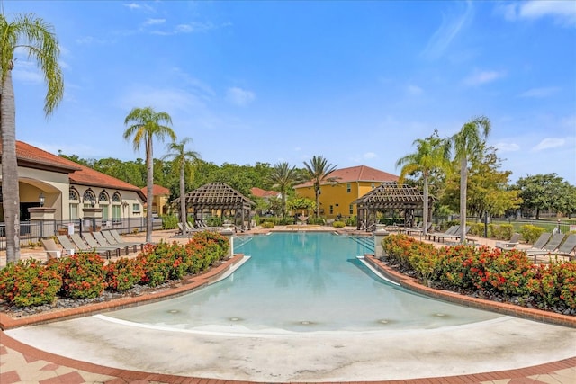 1031 Marcello Blvd, Kissimmee, FL 34746 - community pool featuring a patio and a gazebo