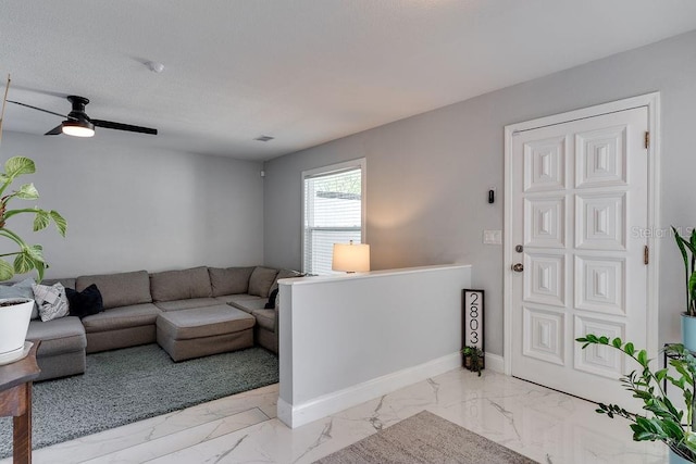2803 Tech Dr, Orlando, FL 32817 - living room with ceiling fan, visible vents, and marble finish floor