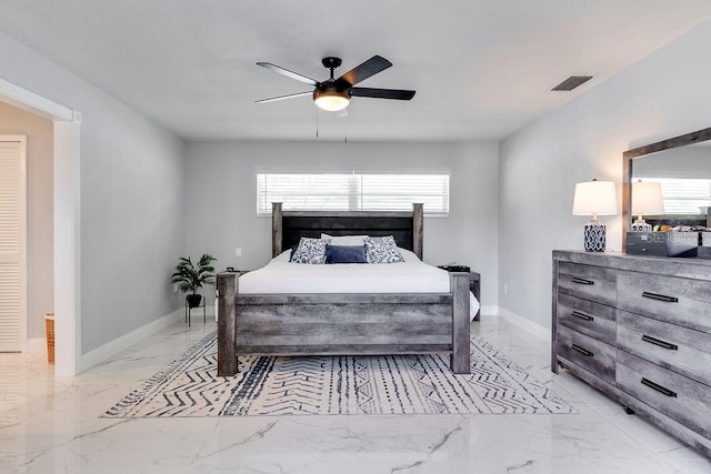 2803 Tech Dr, Orlando, FL 32817 - bedroom featuring baseboards, a ceiling fan, marble finish floor, and visible vents