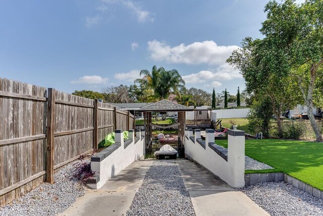 2803 Tech Dr, Orlando, FL 32817 - view of patio with fence and a gazebo