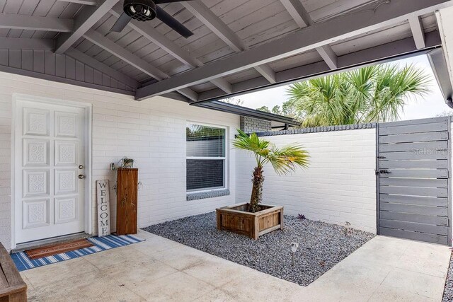 2803 Tech Dr, Orlando, FL 32817 - view of exterior entry featuring fence and brick siding
