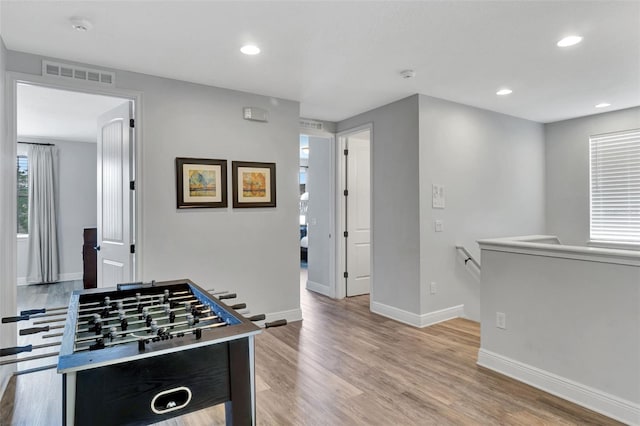 7519 Marker Ave, Kissimmee, FL 34747 - playroom with baseboards, recessed lighting, light wood-style flooring, and visible vents