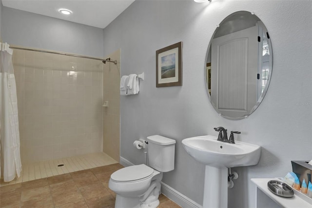 7519 Marker Ave, Kissimmee, FL 34747 - bathroom featuring toilet and tiled shower