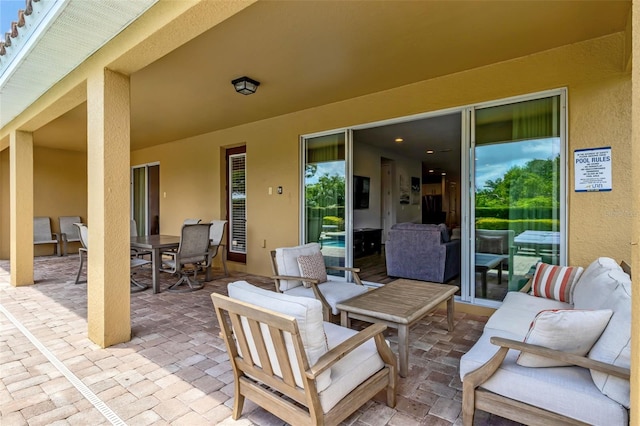 7519 Marker Ave, Kissimmee, FL 34747 - view of patio featuring outdoor dining space and an outdoor living space