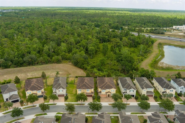 7519 Marker Ave, Kissimmee, FL 34747 - bird's eye view with a water view, a view of trees, and a residential view