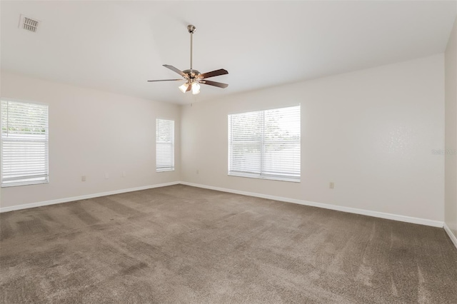 1653 Turtle Rock Dr, Lakeland, FL 33803 - carpeted spare room featuring baseboards, a ceiling fan, and visible vents