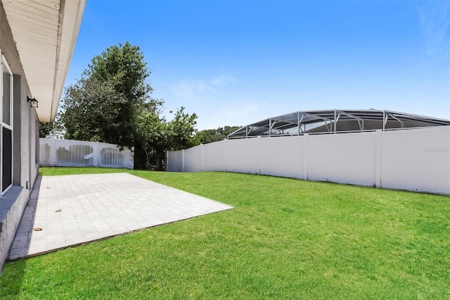 1653 Turtle Rock Dr, Lakeland, FL 33803 - view of yard with a patio and a fenced backyard