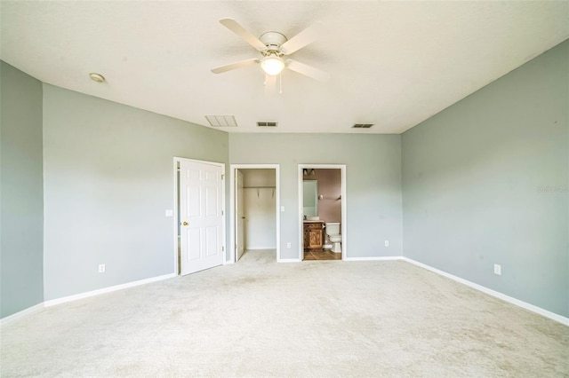 807 Ayden Oak Ln, Ocoee, FL 34761 - unfurnished bedroom with baseboards, light colored carpet, and visible vents