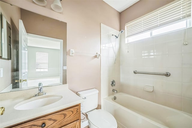 807 Ayden Oak Ln, Ocoee, FL 34761 - bathroom featuring vanity, plenty of natural light, toilet, and shower / washtub combination