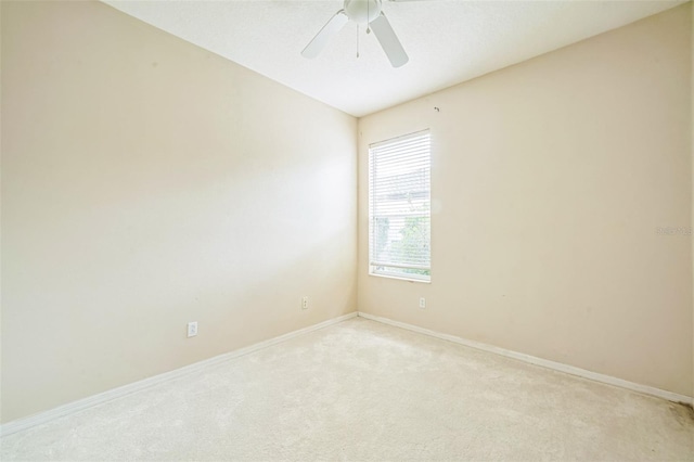 807 Ayden Oak Ln, Ocoee, FL 34761 - empty room with baseboards, a ceiling fan, and light carpet