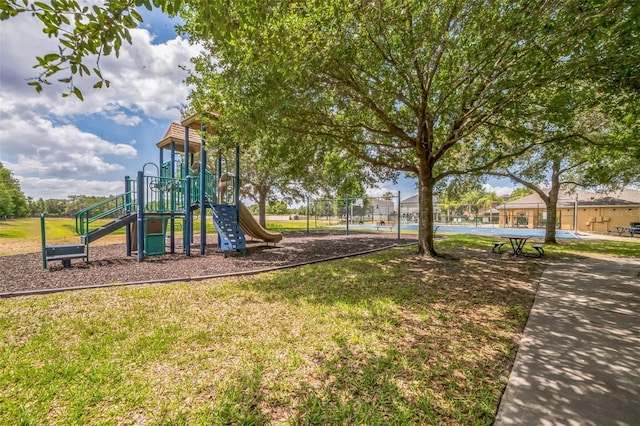 807 Ayden Oak Ln, Ocoee, FL 34761 - communal playground featuring a lawn