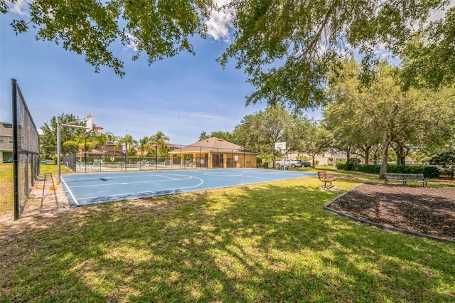 807 Ayden Oak Ln, Ocoee, FL 34761 - view of basketball court with a lawn, fence, and community basketball court