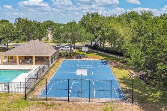 807 Ayden Oak Ln, Ocoee, FL 34761 - view of basketball court featuring a community pool, fence, and community basketball court