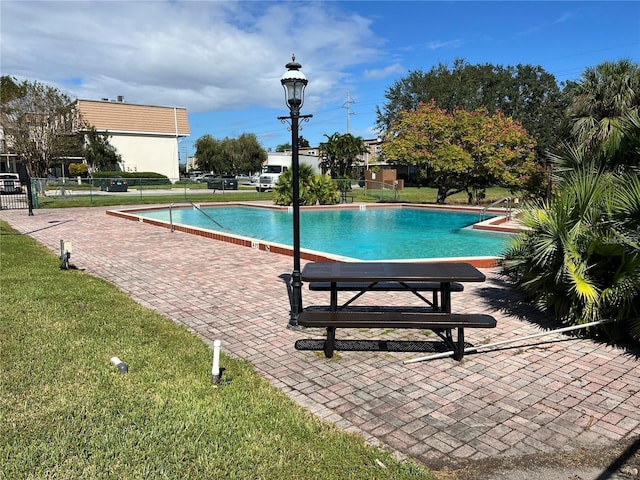 6095 Village Cir Unit 6095, Orlando, FL 32822 - community pool with a patio