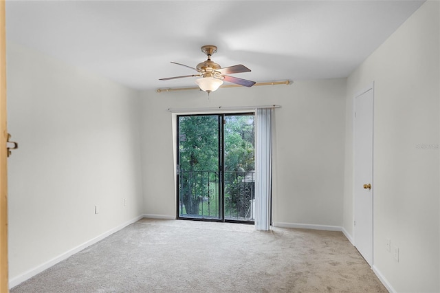6095 Village Cir Unit 6095, Orlando, FL 32822 - unfurnished room featuring carpet flooring, a ceiling fan, and baseboards