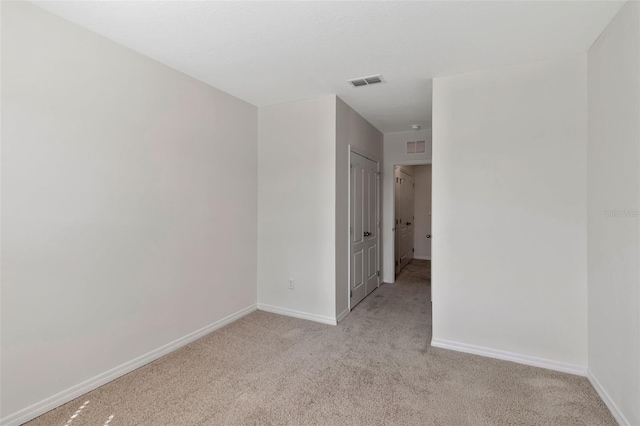 1089 Blue Jay Dr, Davenport, FL 33837 - spare room with light carpet, baseboards, and visible vents
