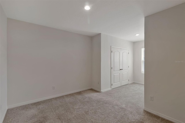 1089 Blue Jay Dr, Davenport, FL 33837 - carpeted empty room with baseboards and recessed lighting