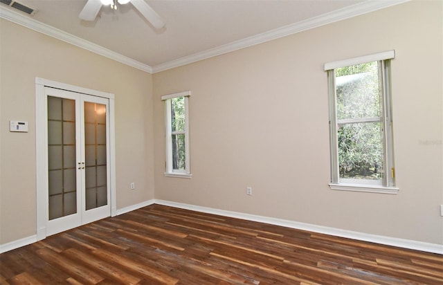 empty room with ornamental molding, visible vents, a healthy amount of sunlight, and french doors