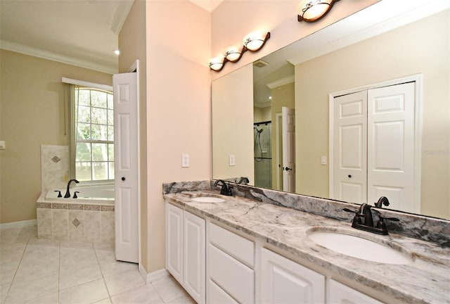 full bathroom with a sink, baseboards, crown molding, and tile patterned floors