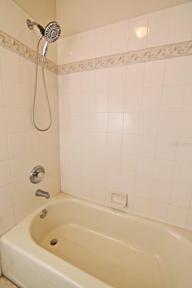 full bathroom with shower / tub combination