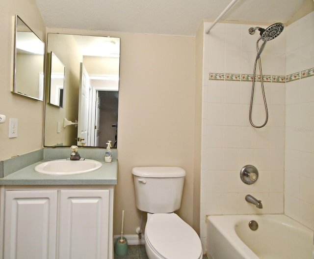 bathroom with toilet, shower / bathing tub combination, and vanity