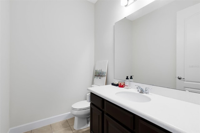 15485 Sandfield Loop, Winter Garden, FL 34787 - half bathroom with tile patterned floors, vanity, toilet, and baseboards